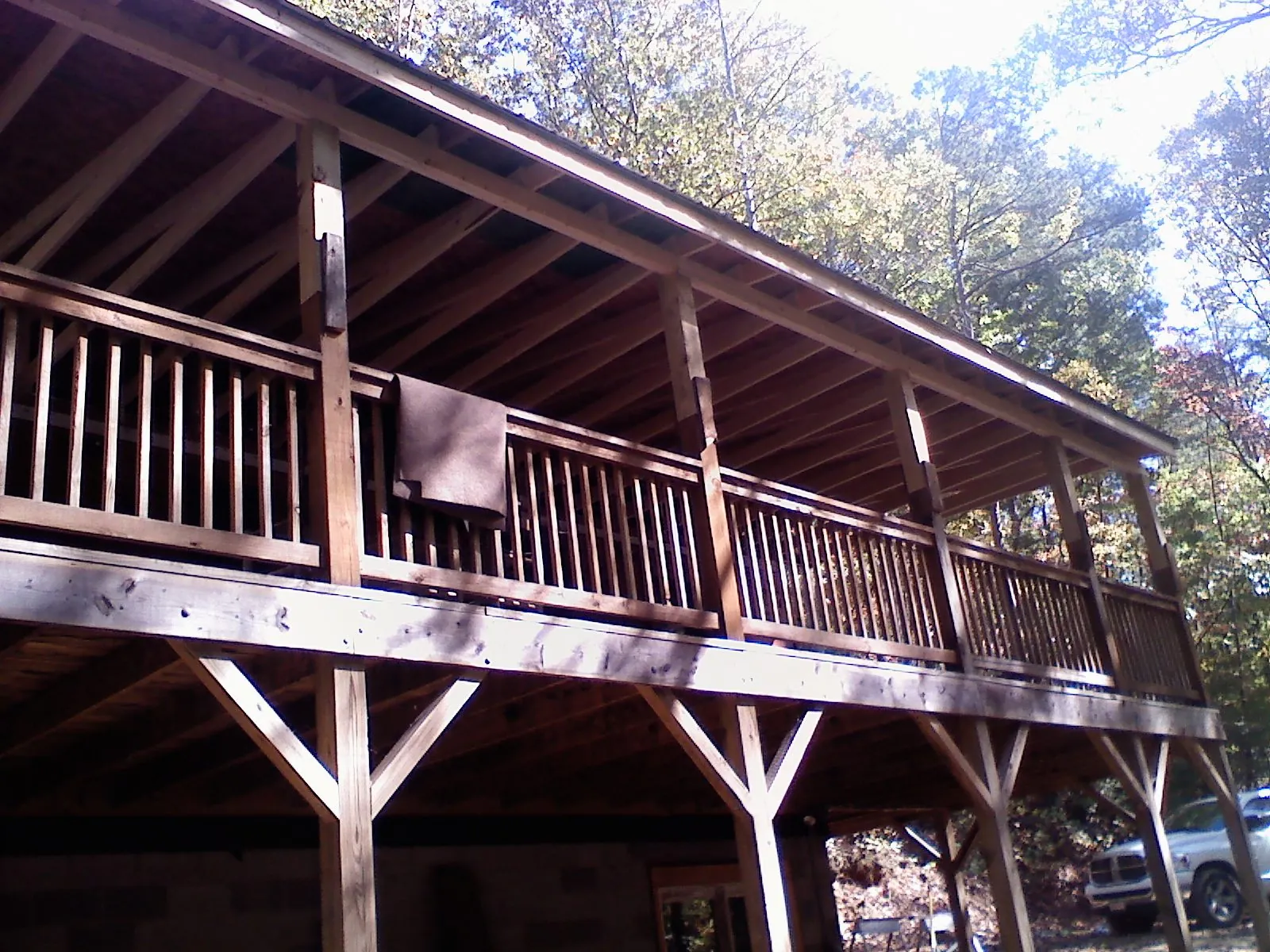 Timber framing under a new elevated porch and deck — Roof Leak Repair in Marcus by Roofing Brothers
